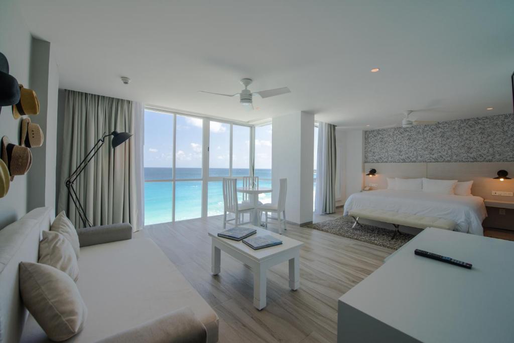 Сьюит (Полулюкс Inspira с видом на океан - Премиум-удобства) курортного отеля Oleo Cancun Playa All Inclusive Boutique Resort, Канкун