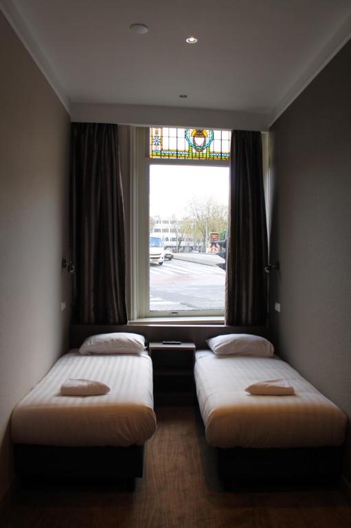 Двухместный (Стандартный двухместный номер с 2 отдельными кроватями) отеля Hotel Blossoms City, Амстердам