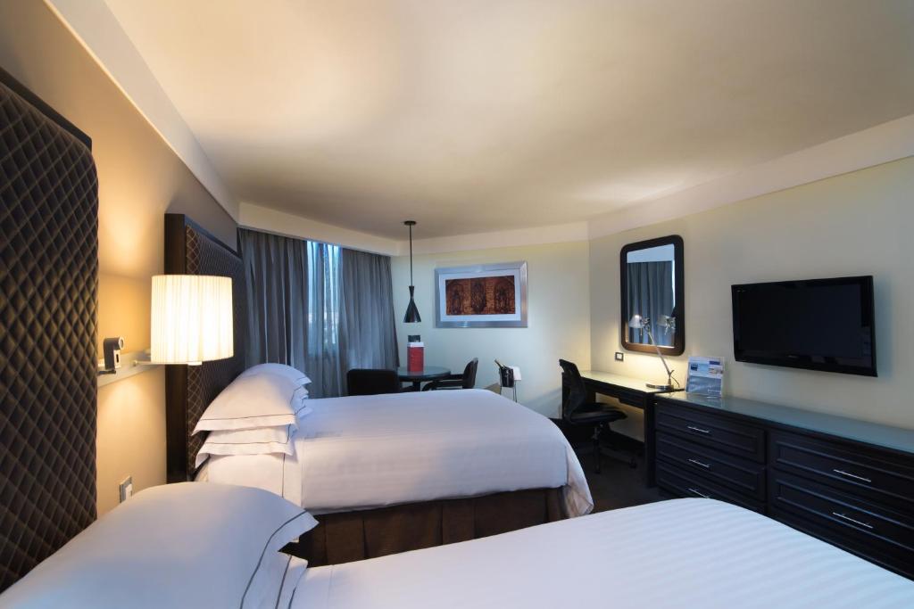 Двухместный (Улучшенный двухместный номер с 1 кроватью) отеля Barcelo Santo Domingo, Санто-Доминго