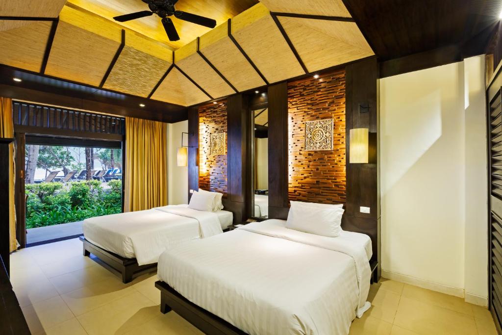 Двухместный (Номер Делюкс с видом на море) курортного отеля Impiana Resort Patong, Phuket, Пхукет