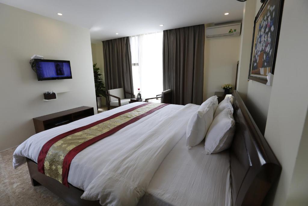 Двухместный (Номер Делюкс с кроватью размера «king-size») отеля Hoang Ngoc Hotel, Донг Ван