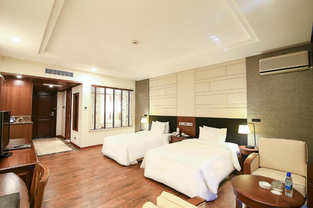 Двухместный (Двухместный номер Делюкс с 2 отдельными кроватями и видом на море) отеля Sai Gon Ha Long Hotel, Халонг
