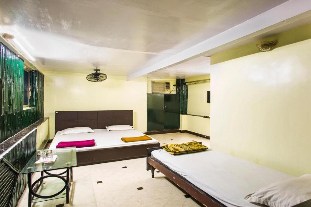 Трехместный (Трехместный номер) отеля Hotel Samrat, Калькутта