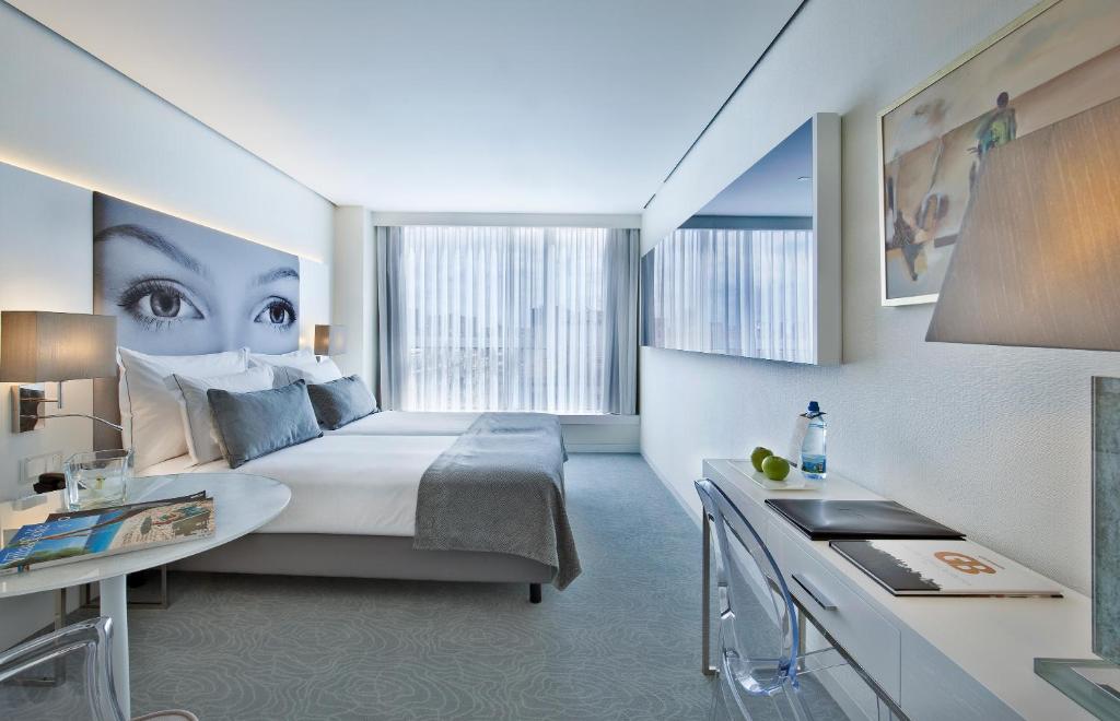 Двухместный (Двухместный номер Делюкс с 1 кроватью или 2 отдельными кроватями, вид на город) отеля Hotel White Lisboa, Лиссабон
