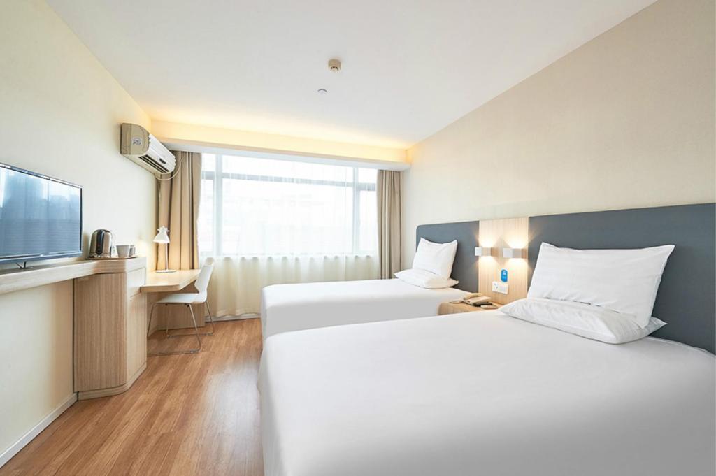 Двухместный (Для граждан материкового Китая ‒ Двухместный номер с 2 отдельными кроватями) отеля Hanting Hotel Shanghai Meichuan Road, Шанхай