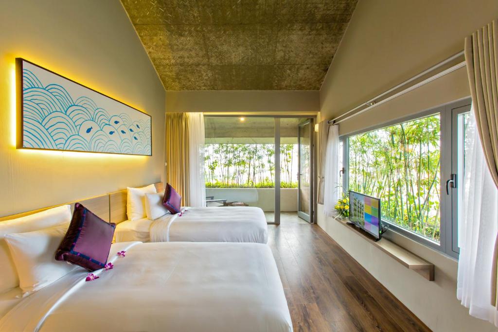 Двухместный (Двухместный номер Делюкс с 2 отдельными кроватями и видом на город) отеля Atlas Hoi An Hotel, Хойан