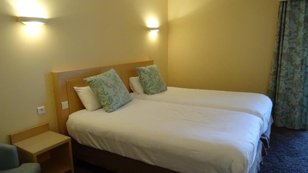 Двухместный (Улучшенный двухместный номер с 2 отдельными кроватями) отеля Club Inn, Ницца