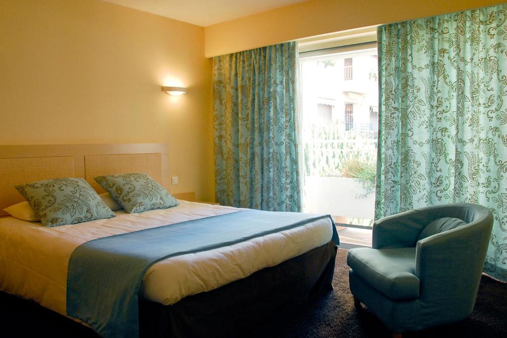 Двухместный (Улучшенный двухместный номер с 1 кроватью) отеля Club Inn, Ницца