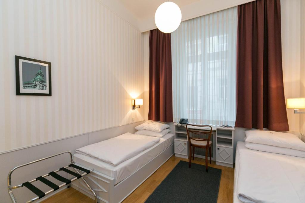 Двухместный (Бюджетный двухместный номер с 2 отдельными кроватями) отеля Hotel Kärntnerhof, Вена