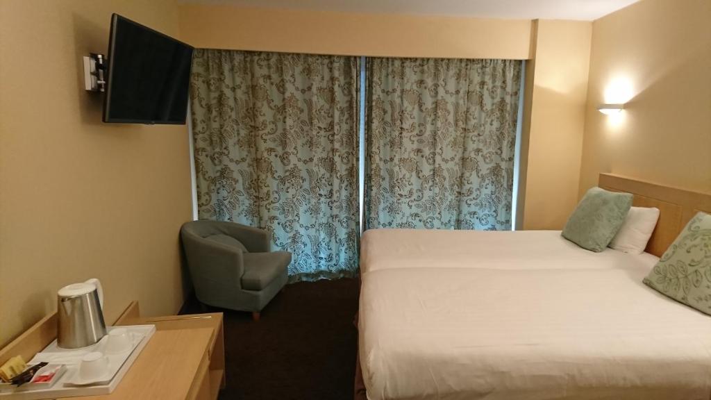 Двухместный (Стандартный двухместный номер с 2 отдельными кроватями) отеля Club Inn, Ницца