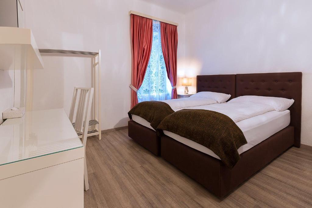 Двухместный (Двухместный номер с 2 отдельными кроватями) отеля Hotel Croce Federale, Беллинцона