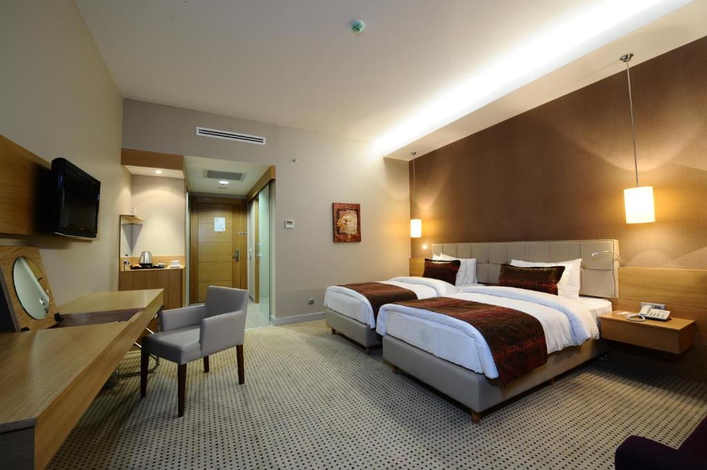 Двухместный (Стандартный двухместный номер с 2 отдельными кроватями) отеля Hotel Ramada Podgorica, Подгорица