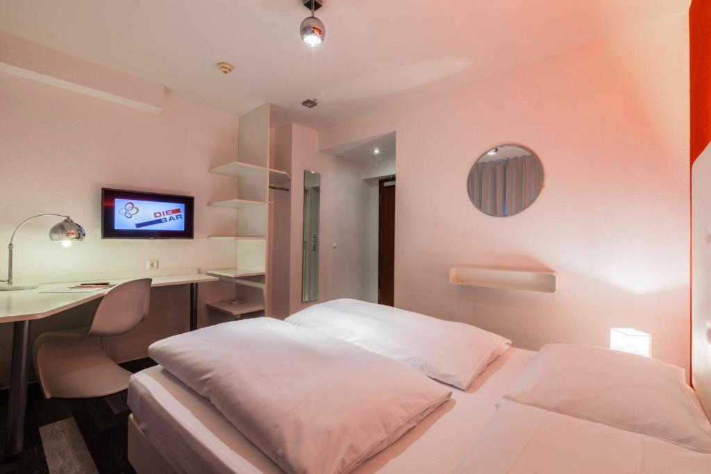 Двухместный (Двухместный номер с 1 кроватью или 2 отдельными кроватями) отеля Cityhotel Monopol, Гамбург
