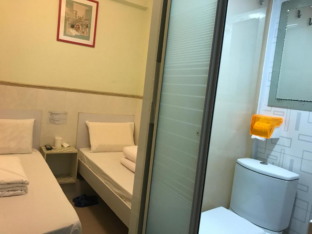 Двухместный (Двухместный номер с 2 отдельными кроватями) гостевого дома Beverly Guest House, Гонконг (город)