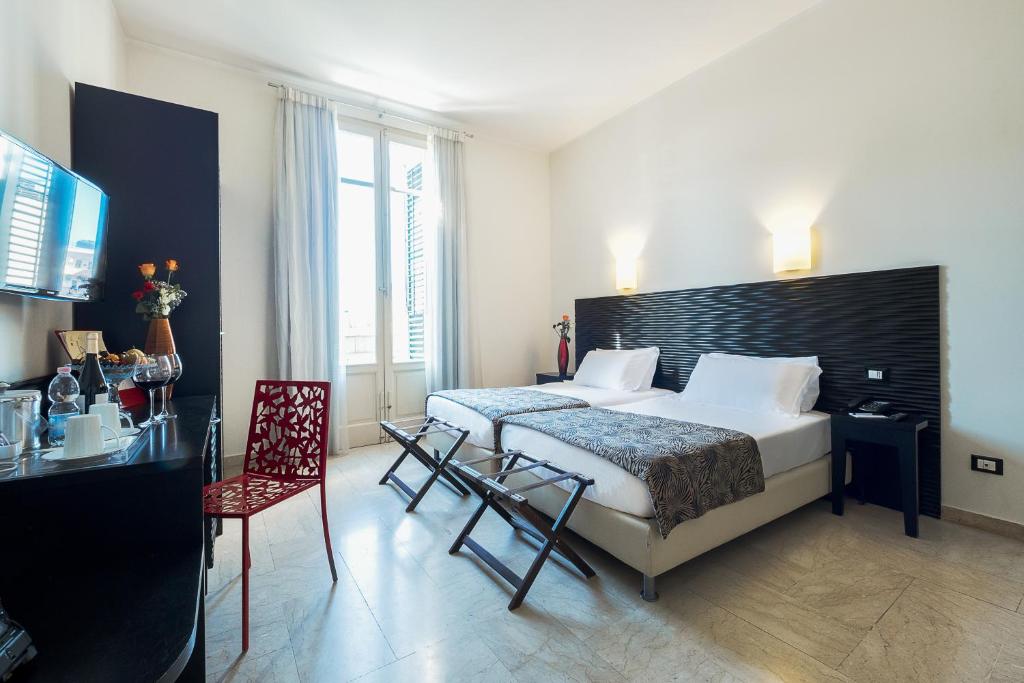 Двухместный (Двухместный номер с 1 кроватью или 2 отдельными кроватями и базовыми удобствами) отеля Hotel Garibaldi, Палермо