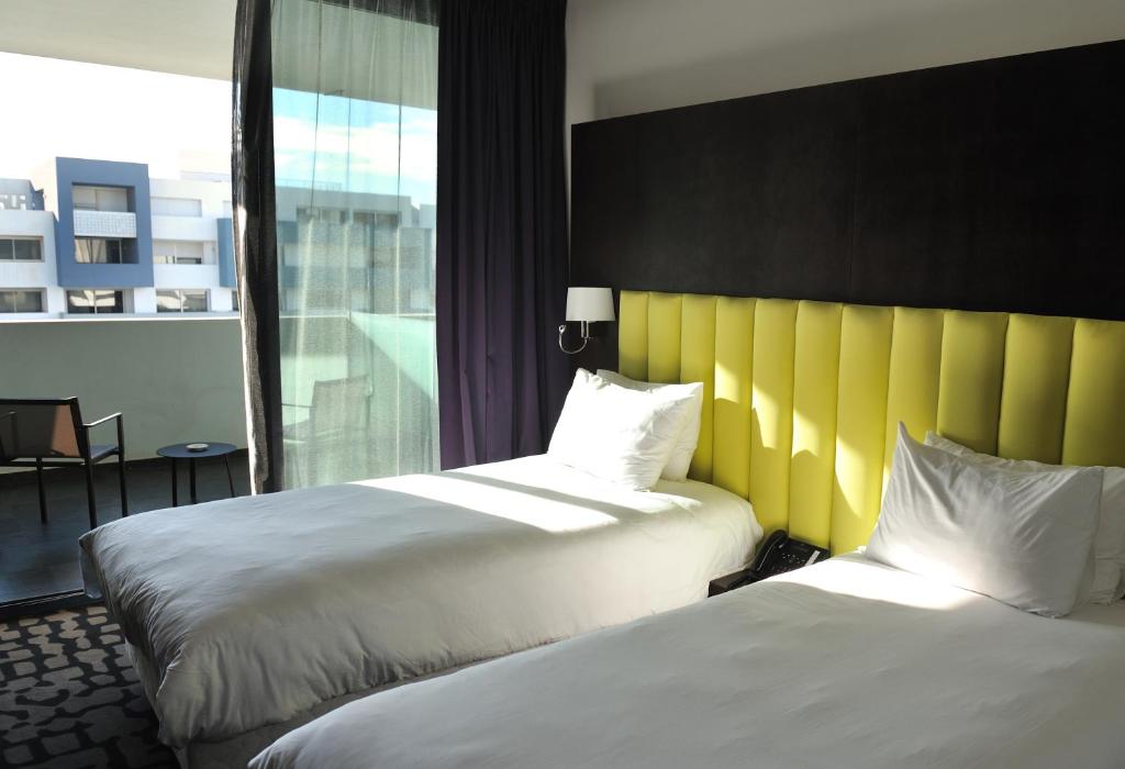 Двухместный (Улучшенный двухместный номер с 2 отдельными кроватями) отеля Hotel Mercure Nador Rif, Надор