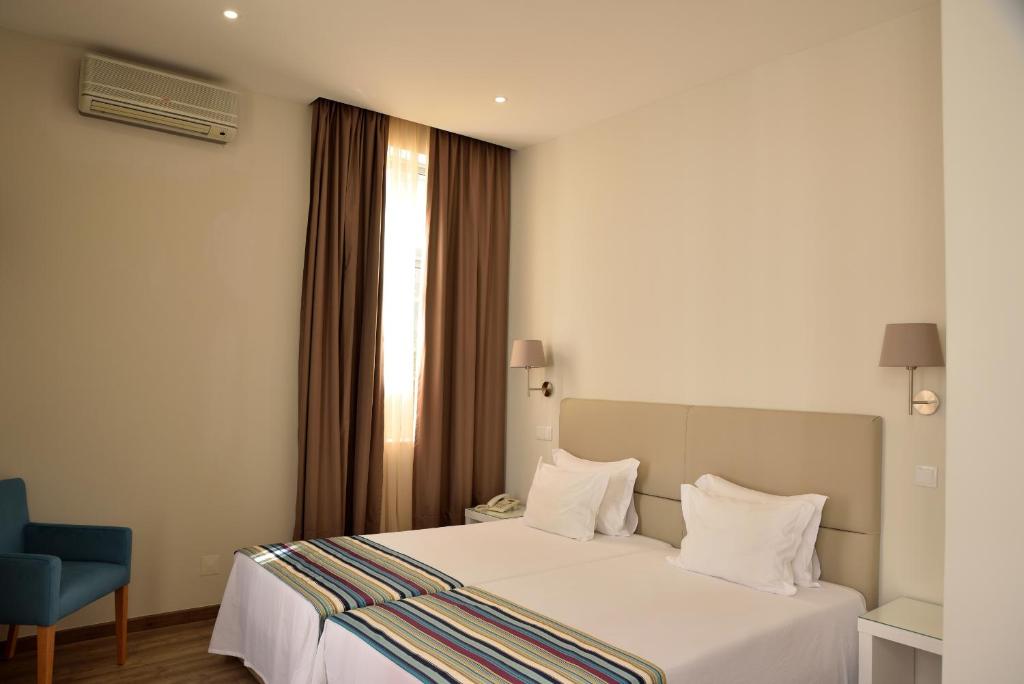 Двухместный (Двухместный номер с 2 отдельными кроватями) отеля Porto Domus Hotel, Порту