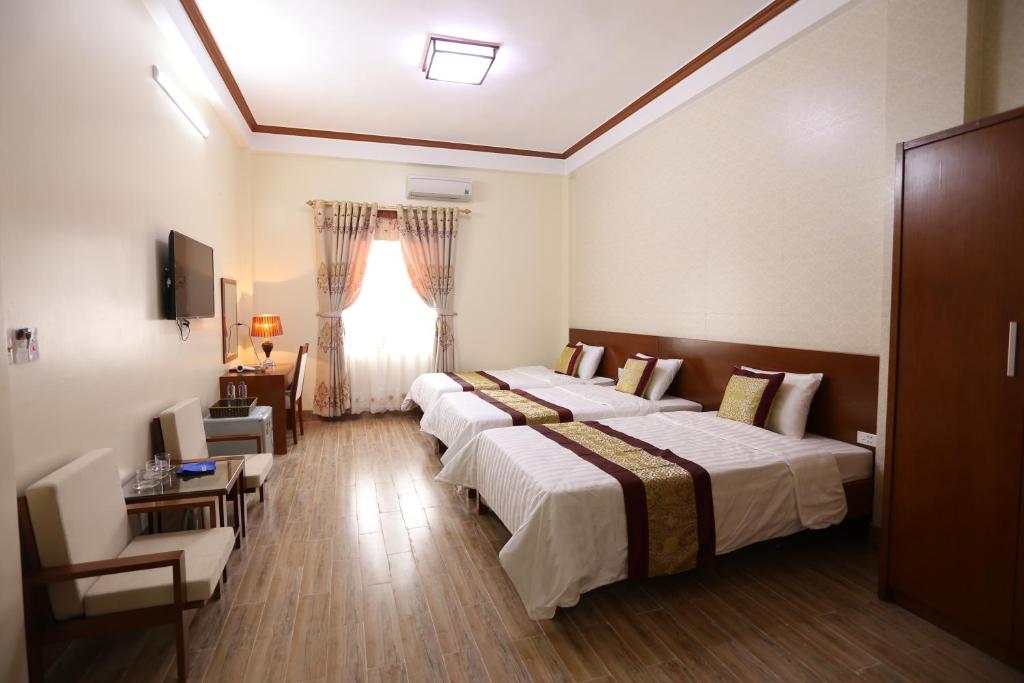Трехместный (Трехместный номер) отеля Royal Hotel Ha Giang, Хазянг