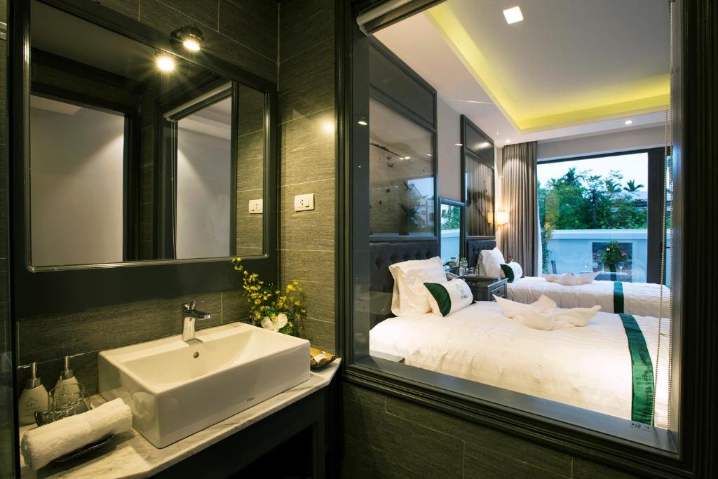 Двухместный (Улучшенный двухместный номер с 2 отдельными кроватями) виллы Ivy Villa, Хойан