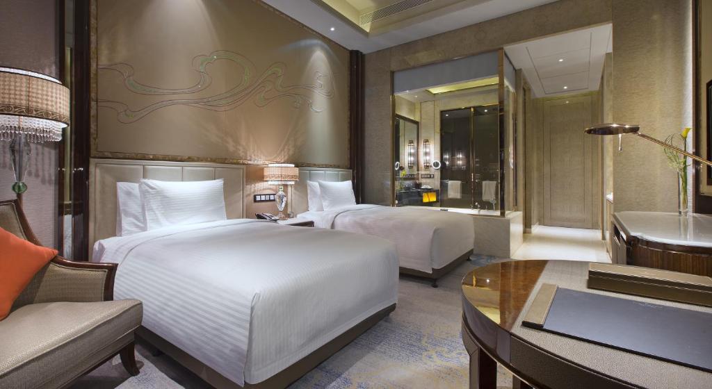 Двухместный (Представительский двухместный номер Делюкс с 2 отдельными кроватями) отеля Wanda Vista Lanzhou, Ланьчжоу