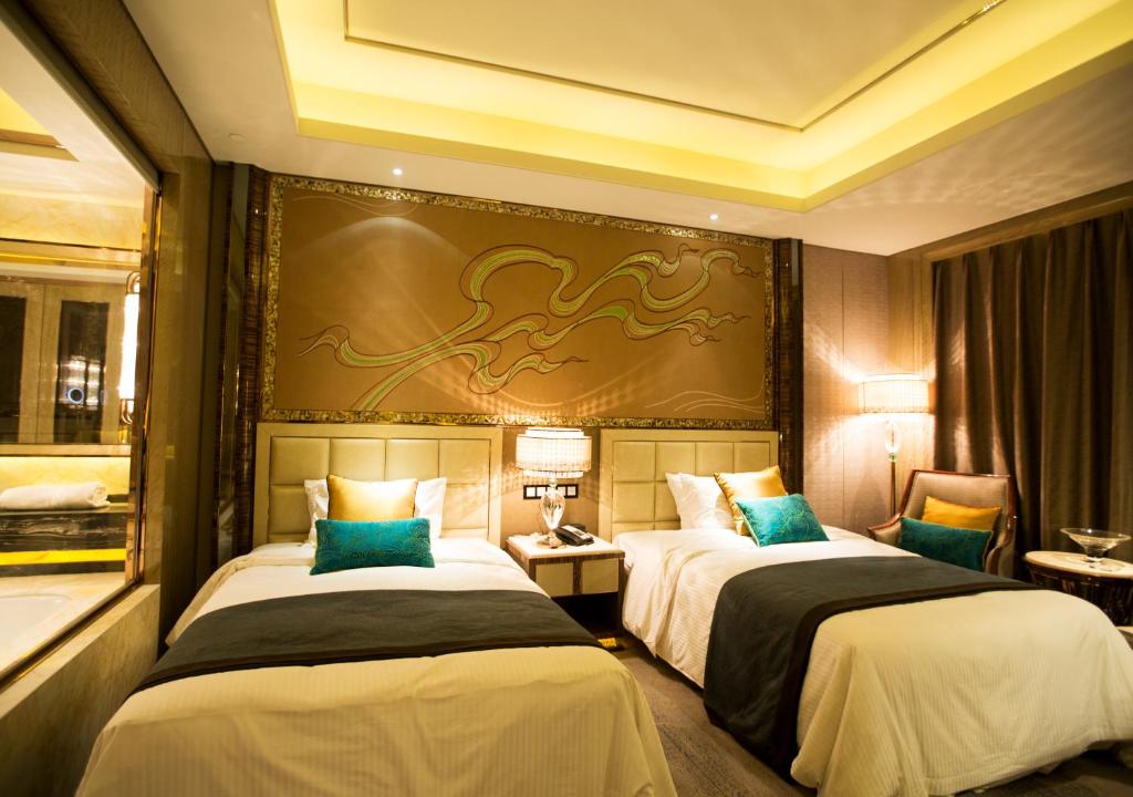 Двухместный (Двухместный номер Делюкс с 2 отдельными кроватями) отеля Wanda Vista Lanzhou, Ланьчжоу