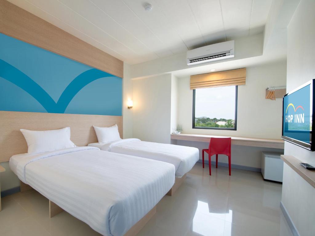 Двухместный (Стандартный двухместный номер с 2 отдельными кроватями) отеля Hop Inn Mukdahan, Мукдахан