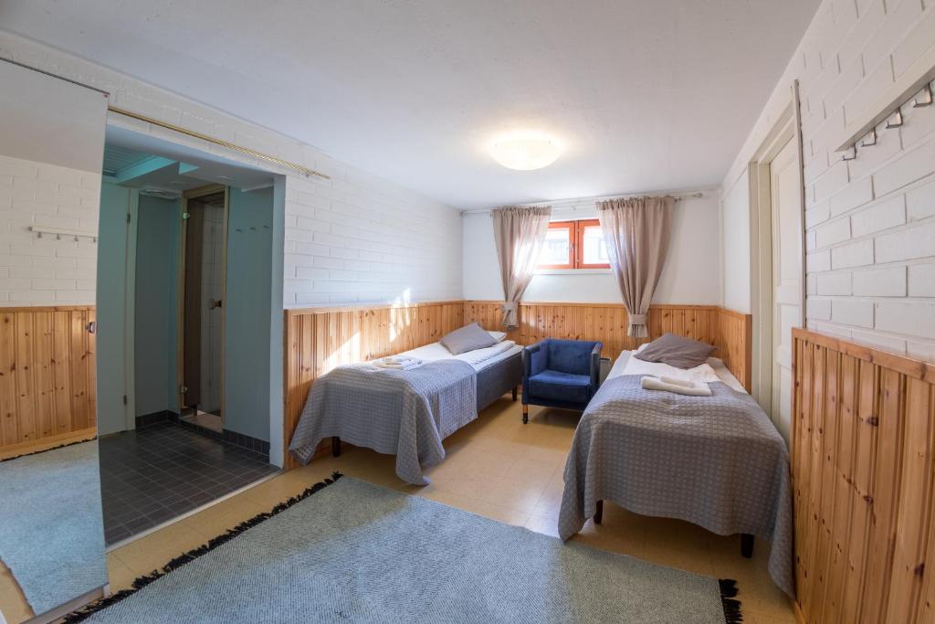 Двухместный (Улучшенный двухместный номер с 2 отдельными кроватями и сауной) отеля Hotel Haapalinna, Тампере
