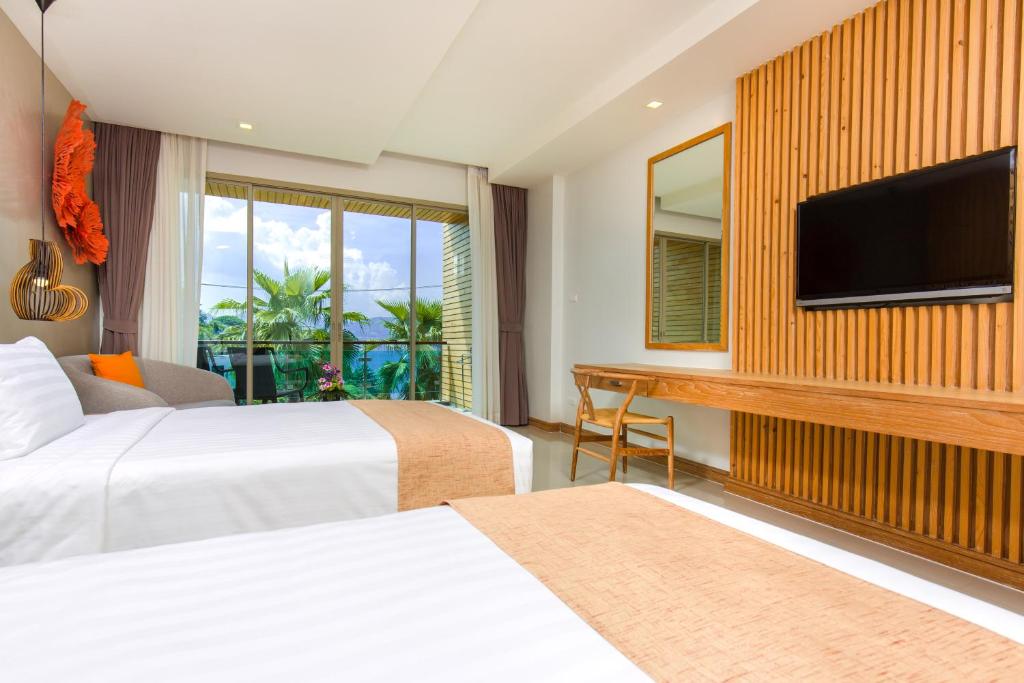 Двухместный (Двухместный номер Делюкс с 2 отдельными кроватями) курортного отеля Wyndham Grand Phuket Kalim Bay, Пхукет