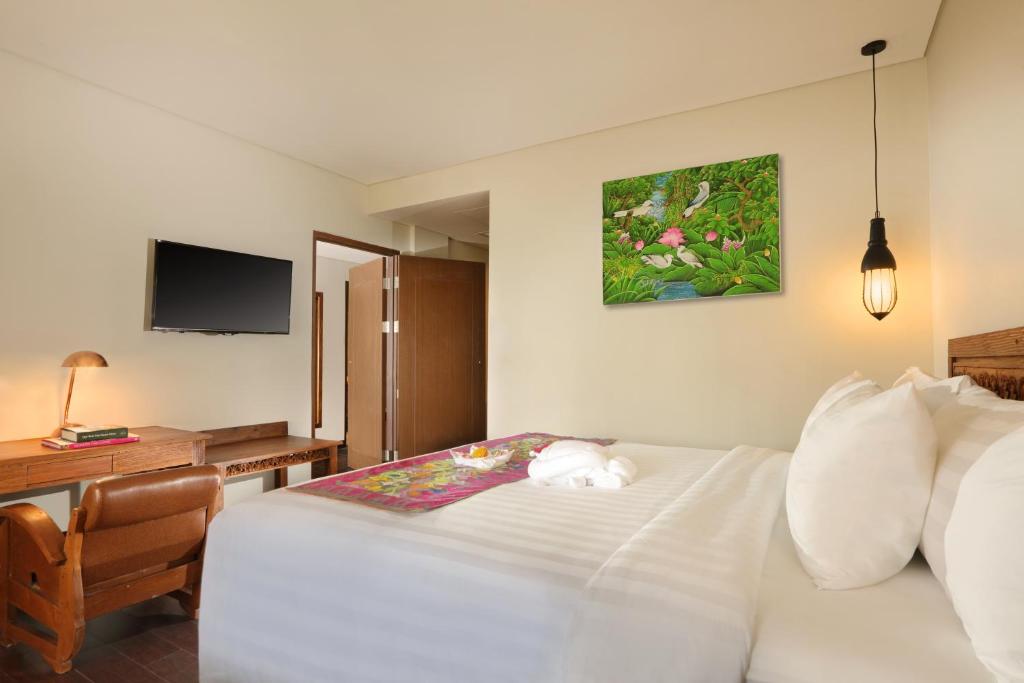 Двухместный (Номер Делюкс с видом на зеленый пейзаж и 1 бесплатным балийским ужином рийстафель) курортного отеля Best Western Premier Agung Resort Ubud, Убуд