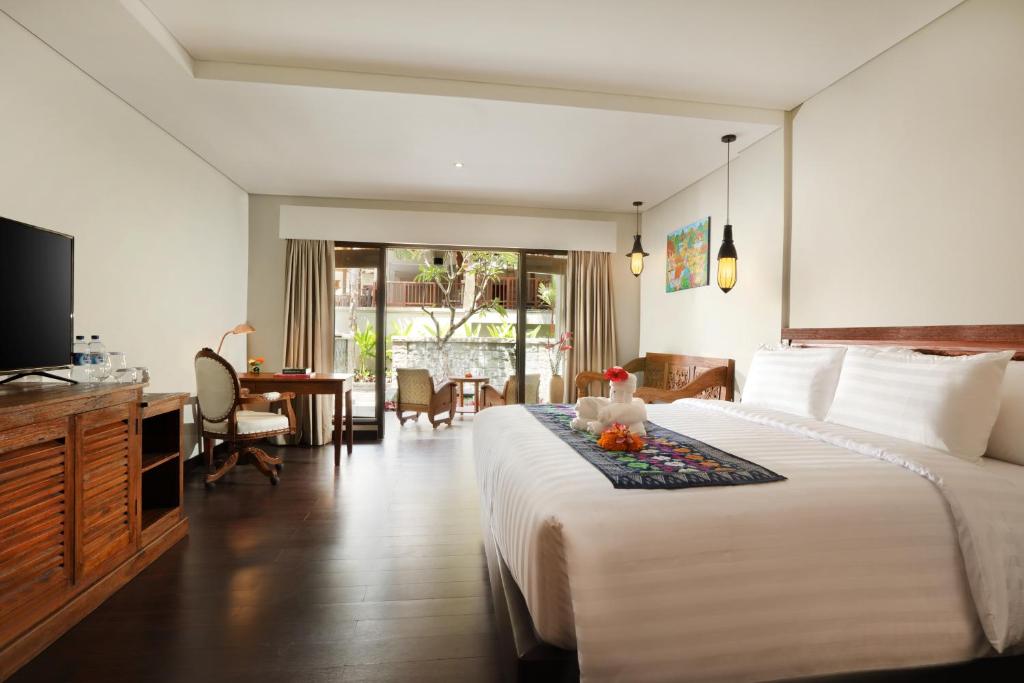 Двухместный (Двухместный номер Делюкс с 1 кроватью или 2 отдельными кроватями, вид на тропическую растительность) курортного отеля Best Western Premier Agung Resort Ubud, Убуд