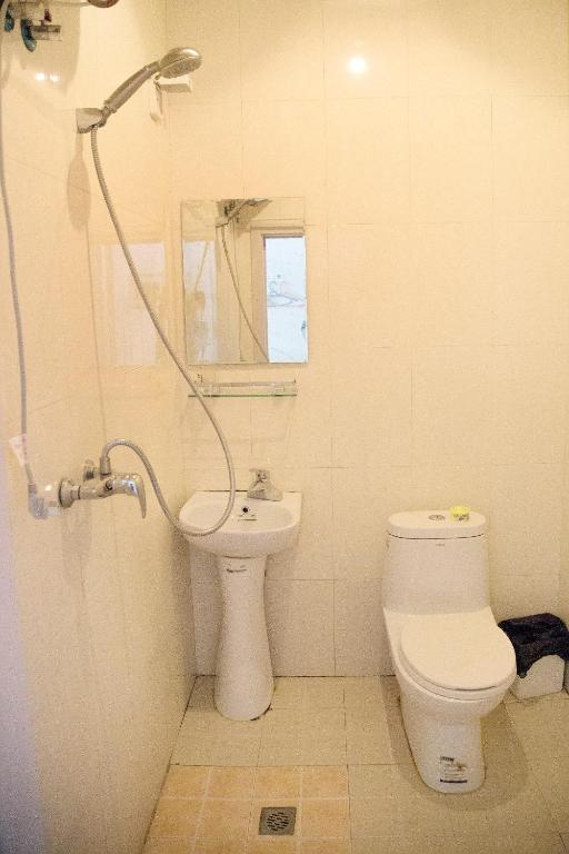 Номер (Кровать в общем номере с 4 кроватями и общей ванной комнатой) хостела Harbin North International Youth Hostel, Харбин