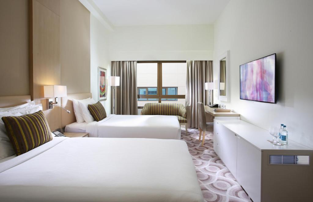 Двухместный (Двухместный номер Делюкс с 1 кроватью или 2 отдельными кроватями + Билеты на шоу LA PERLE) отеля Metropolitan Hotel Dubai, Дубай