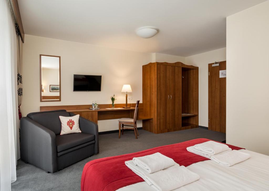 Двухместный (Улучшенный двухместный номер с 1 кроватью или 2 отдельными кроватями и террасой) отеля Hotel Logos, Закопане