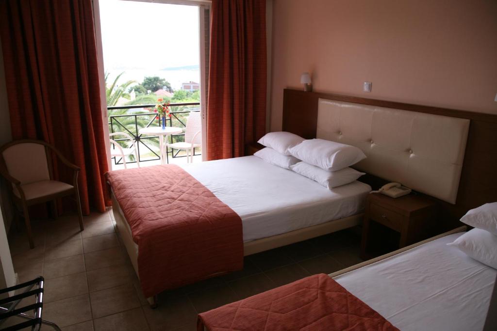 Двухместный (Двухместный номер с 1 кроватью или 2 отдельными кроватями и видом на сад и бассейн) отеля Palatino Hotel, Ликсорион