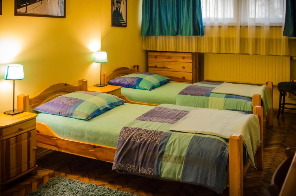 Двухместный (Двухместный номер с 2 отдельными кроватями и собственной ванной комнатой) семейного отеля Indalo Rooms, Краков