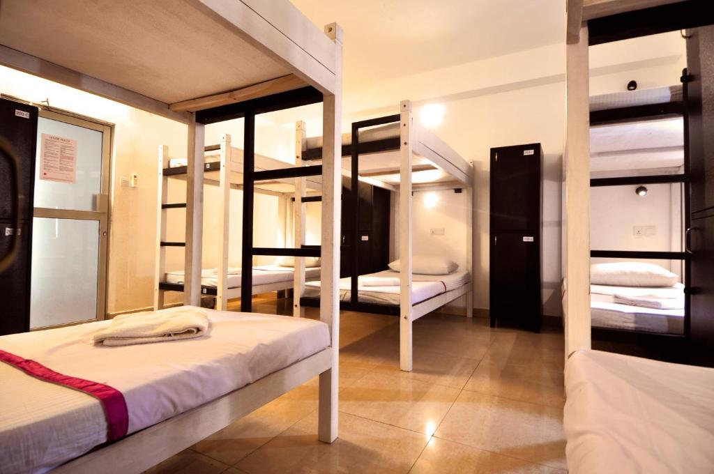 Номер (Односпальная кровать в общем номере для женщин) хостела Clock Inn Dehiwala, Деивала