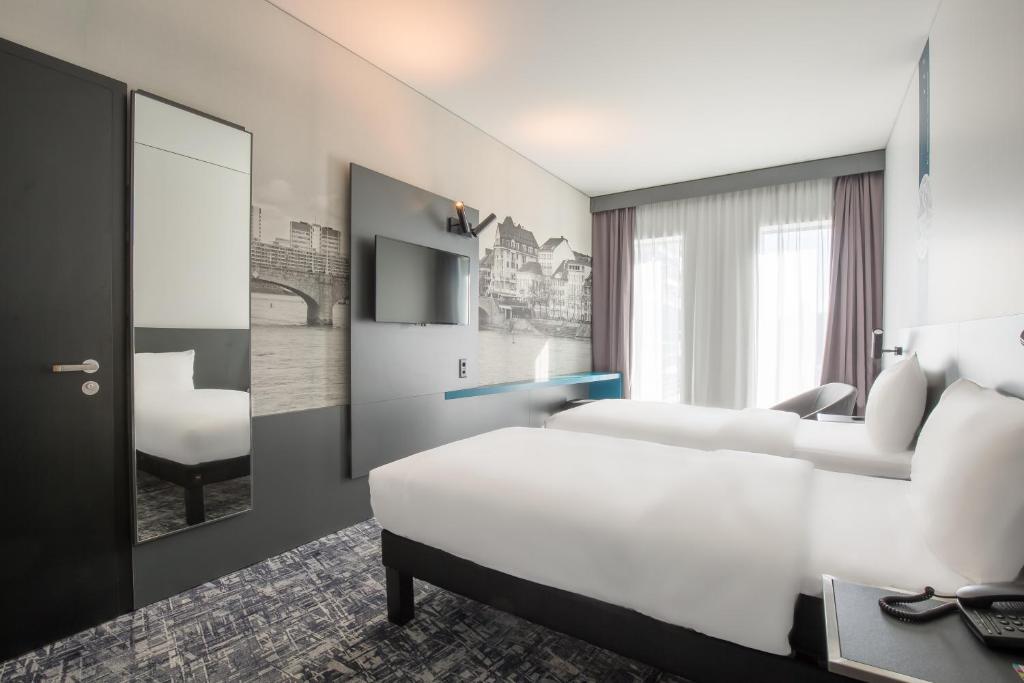 Двухместный (Стандартный двухместный номер с 2 отдельными кроватями) отеля ibis Styles Basel City, Базель