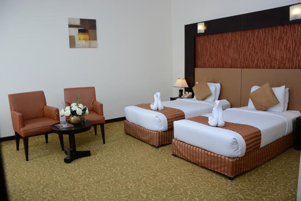 Двухместный (Стандартный двухместный номер с 1 кроватью или 2 отдельными кроватями) отеля Aryana Hotel, Шарджа
