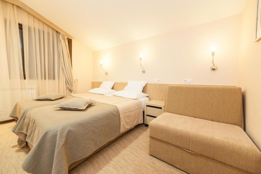 Двухместный (Двухместный номер с 1 кроватью и диваном-кроватью) отеля Dunav Turist Inn, Златибор