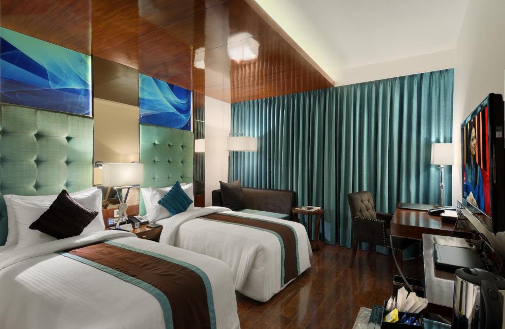 Двухместный (Двухместный номер Делюкс с 1 кроватью или 2 отдельными кроватями) отеля The Elanza Hotel, Bangalore, Бангалор