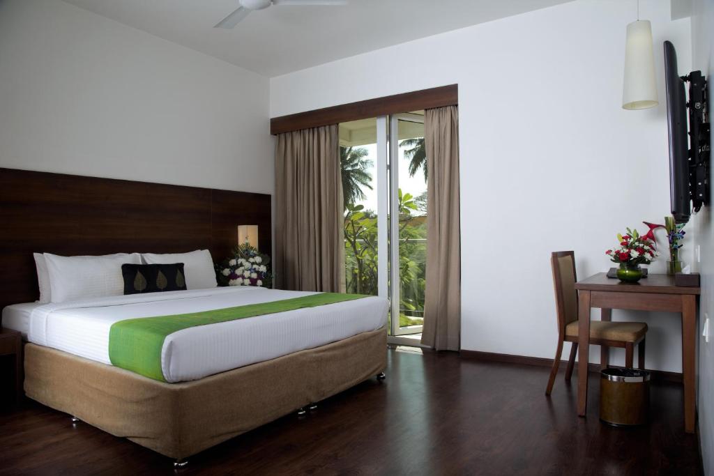 Двухместный (Двухместный номер с 1 кроватью или 2 отдельными кроватями, вид на сад) отеля Temple Tree Hotel, Бангалор