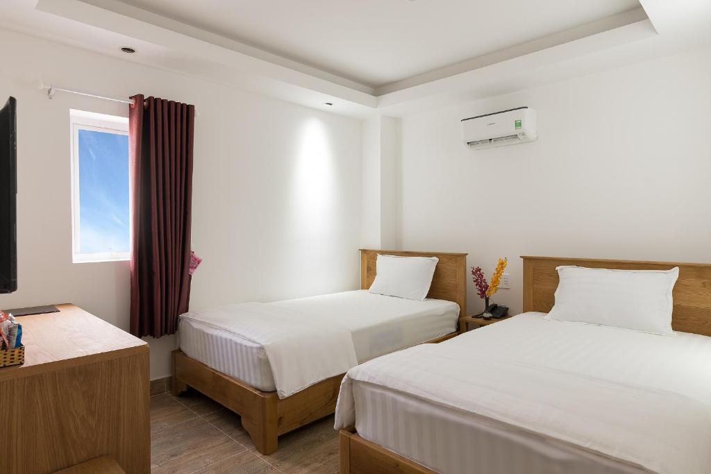 Двухместный (Стандартный двухместный номер с 2 отдельными кроватями) отеля VeeVoo Hotel, Вунгтау
