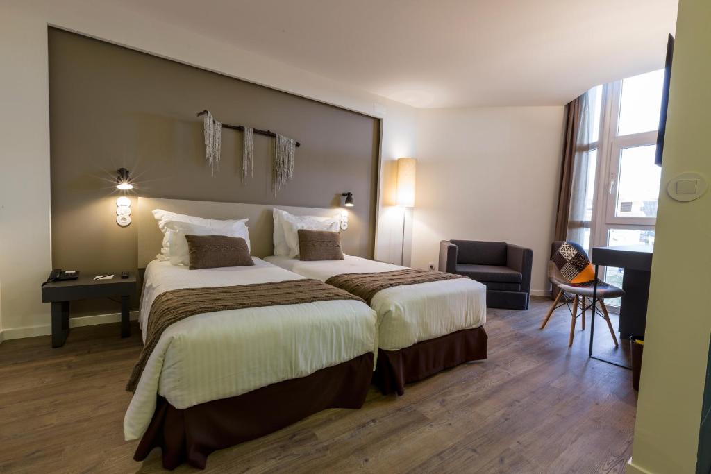 Двухместный (Двухместный номер с 2 отдельными кроватями) отеля Puralã - Wool Valley Hotel & SPA, Ковильян