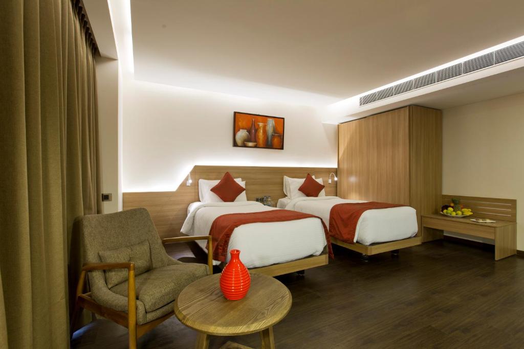 Двухместный (Представительский двухместный номер с 1 кроватью или 2 отдельными кроватями) отеля Attide Hotel, Бангалор
