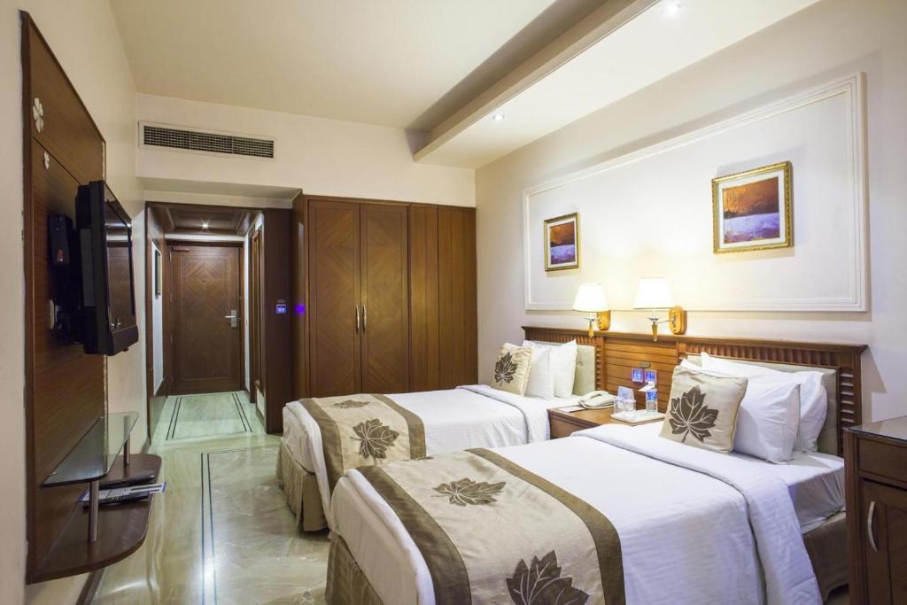 Трехместный (Стандартный трехместный номер) отеля Clarion Bella Casa Jaipur, Джайпур