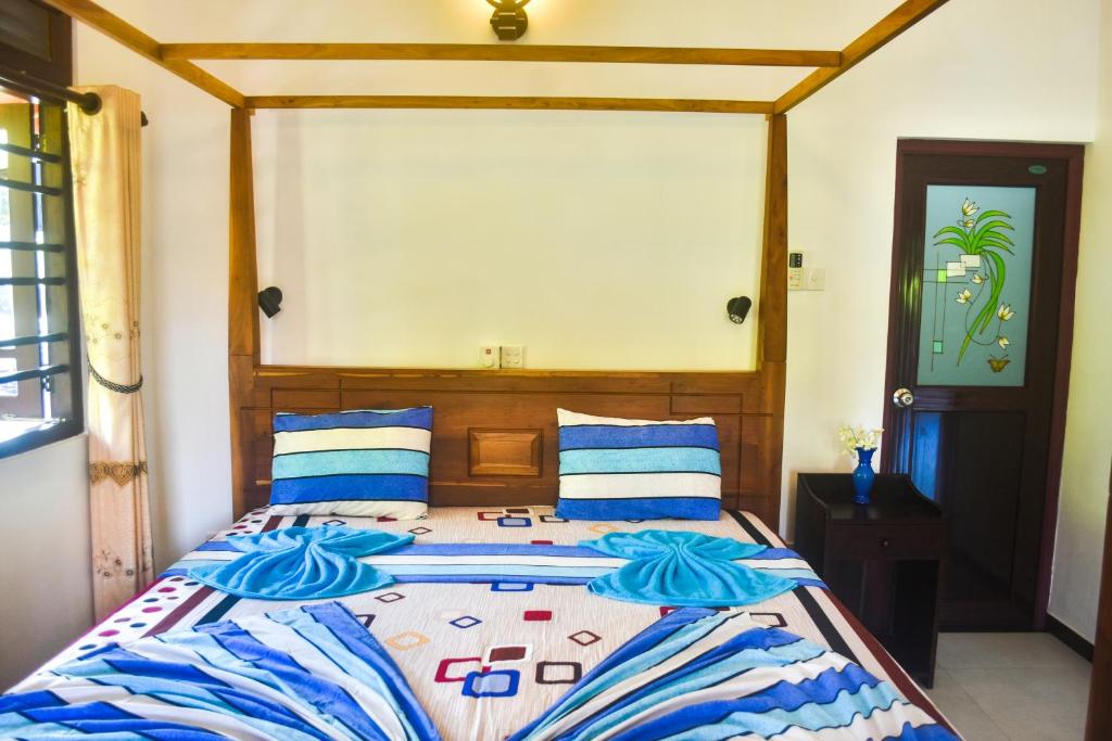Двухместный (Двухместный номер Делюкс с 1 кроватью) отеля Southern Coastal Villas, Хиккадува
