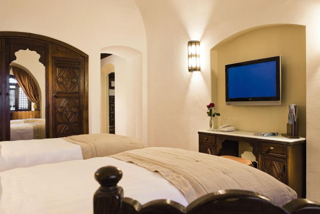 Двухместный (Классический номер Твин с частичным видом на море) курортного отеля Mövenpick Resort Sharm El Sheikh, Шарм-эль-Шейх