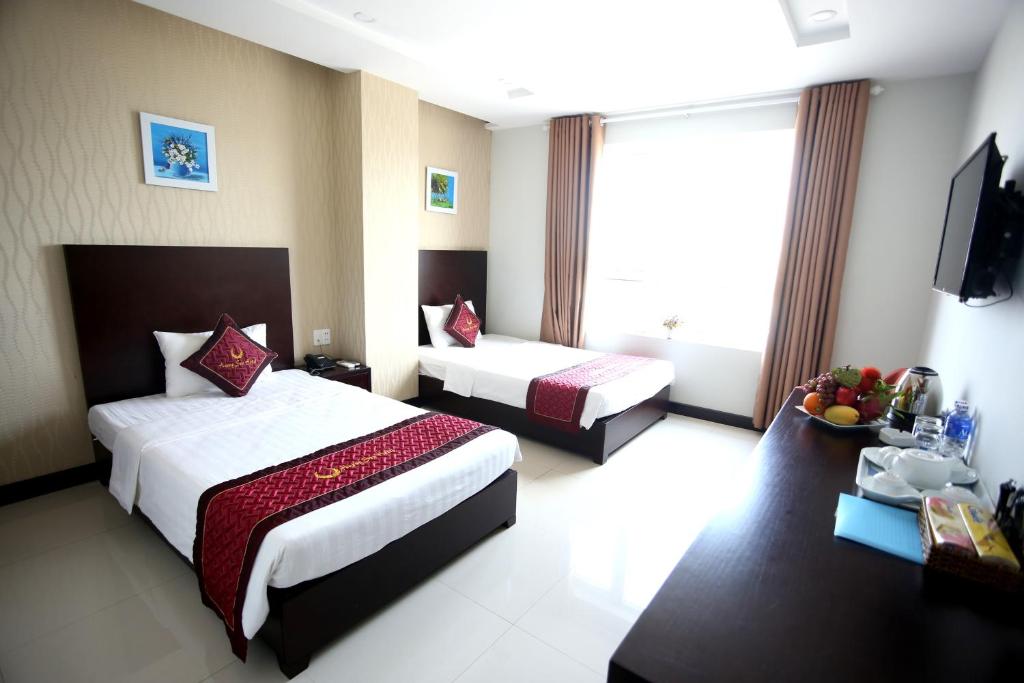 Двухместный (Двухместный номер Делюкс с 1 кроватью или 2 отдельными кроватями) отеля Huong Son Hotel Da Nang, Дананг