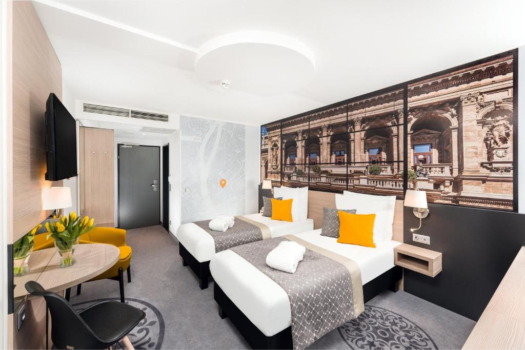 Двухместный (Двухместный номер Privilege с 2 отдельными кроватями) отеля Mercure Budapest City Center, Будапешт