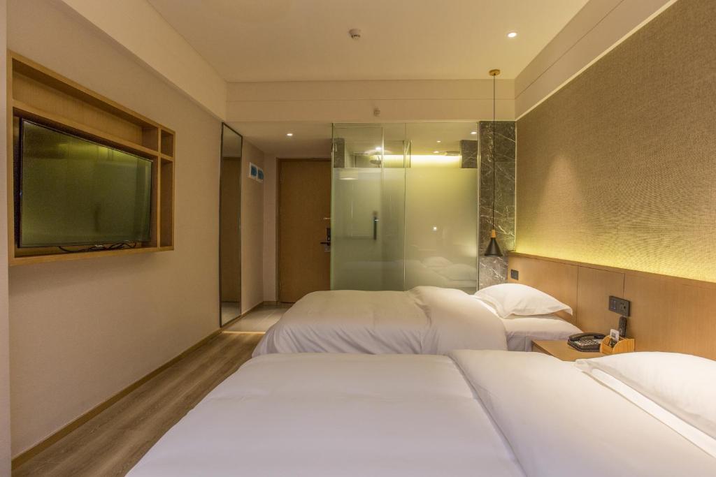 Двухместный (Двухместный номер «Комфорт» с 2 отдельными кроватями) отеля YAT House, Гуанчжоу